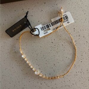 NWT Elegant Gold Bracelet with Crystal Accents